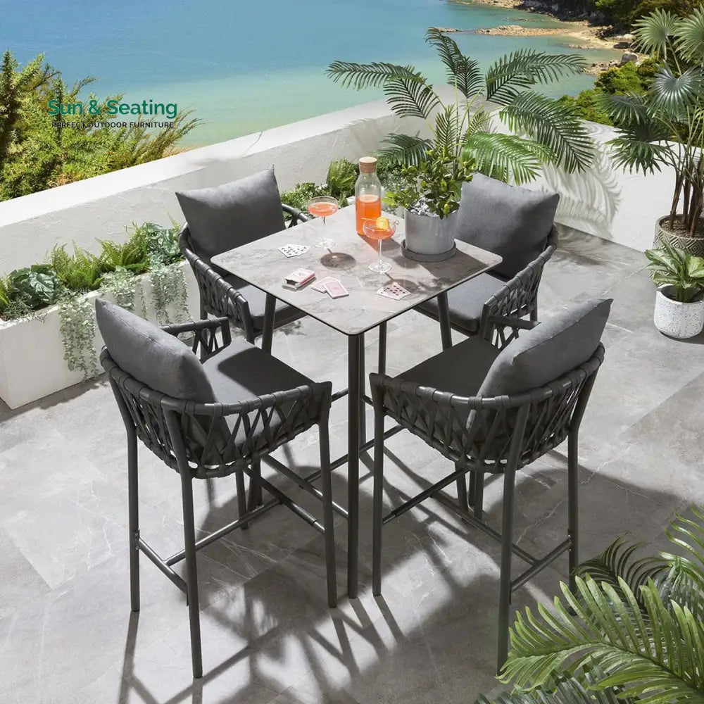 Verónica Outdoor Patio Bar Set 4 Chairs and 1 Table Set Braided &amp; Rope Bar Sets