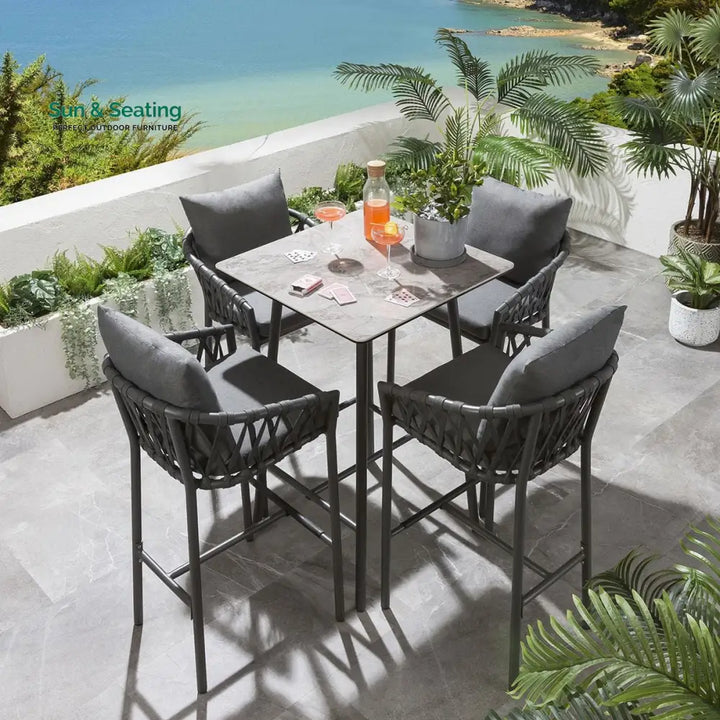 Verónica Outdoor Patio Bar Set 4 Chairs and 1 Table Set Braided &amp; Rope Bar Sets