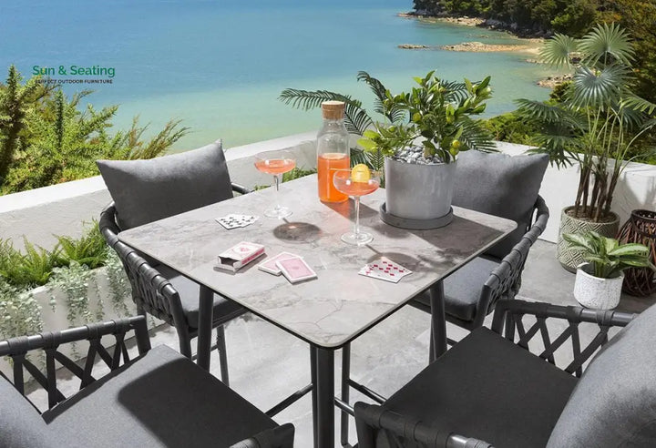 Verónica Outdoor Patio Bar Set 4 Chairs and 1 Table Set Braided &amp; Rope Bar Sets