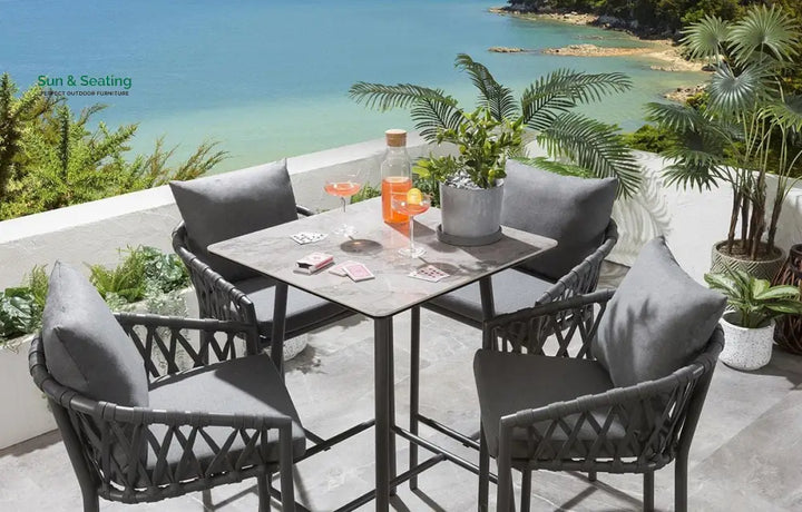 Verónica Outdoor Patio Bar Set 4 Chairs and 1 Table Set Braided &amp; Rope Bar Sets